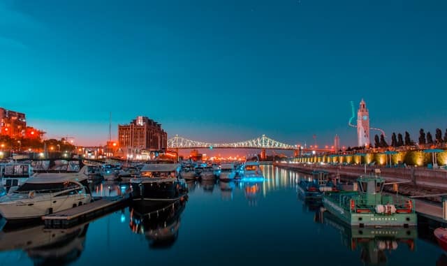 Elite Montreal Escorts 10 boat docked far away from suspension bridge