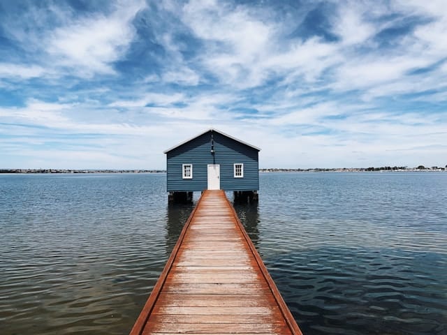 Luxury Perth Escorts 11 brown wooden dock on sea under blue sky during daytime