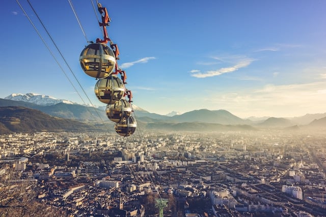 GFE Grenoble 5 yellow and black cable car over city during daytime