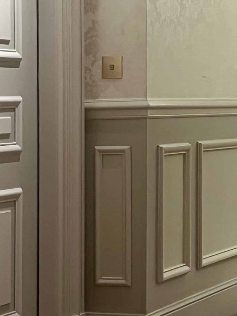 A luxury hallway with damask wall dressings: Escort client etiquette