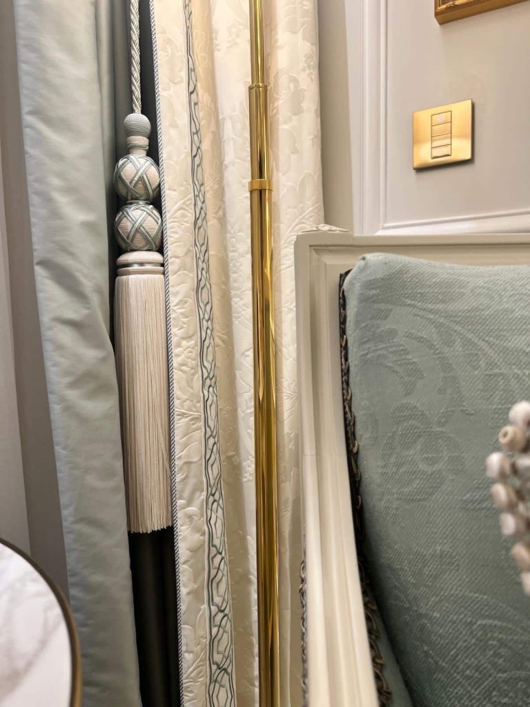 An opulent sitting area with luxury drapes: booking guide for exclusive escort services