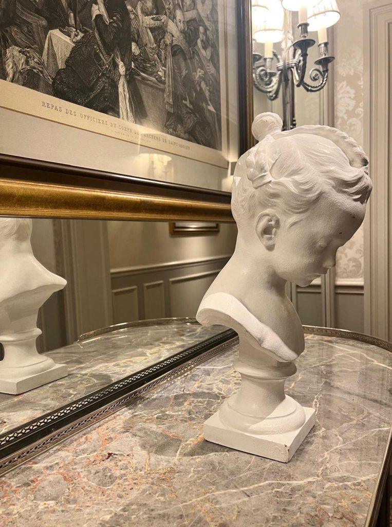 ceramic bust of a cherub - how Mynt Models supports divorcees