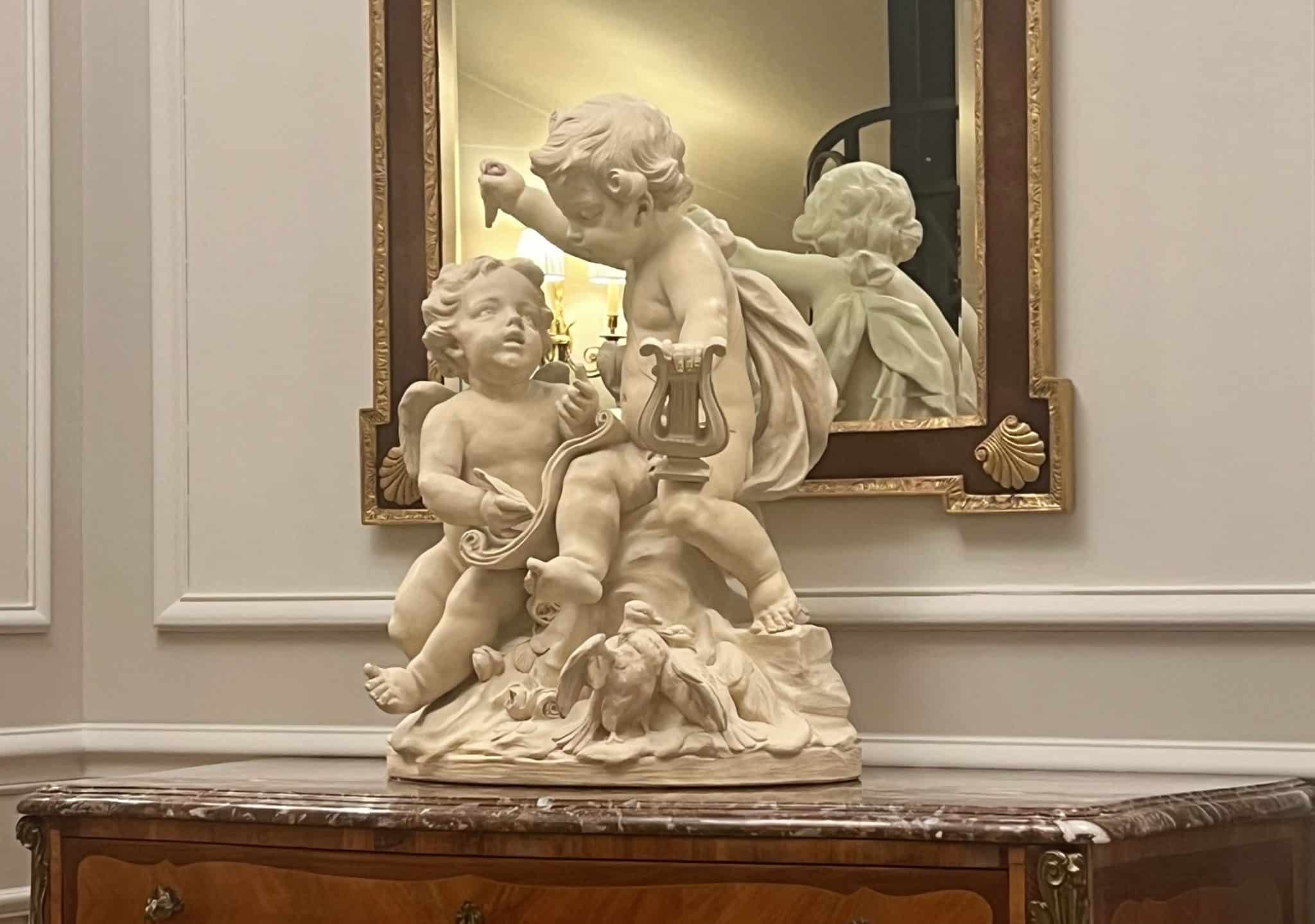Classic statue of Cherubs playing: Bringing quality people together for mutually enjoyable experiences